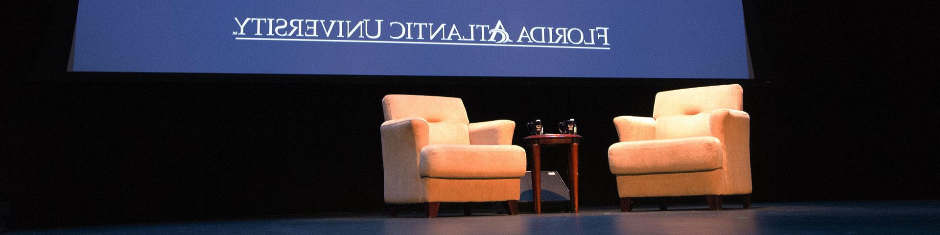 Two chairs on stage